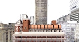 Architectural render of Peoples Palace brick building with proposed new Black roof. Building surrounded by city buildings.