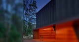 Gallery Entrance detail of entry at dusk of the Mon Repos Turtle Centre architecturally designed by KIRK Studio. Photography by Scott Burrows.